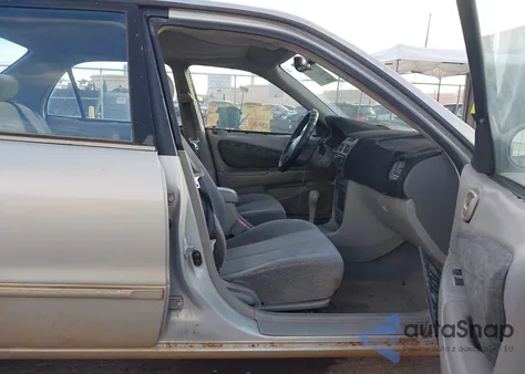 2001 Toyota Corolla Le z USA, uszkodzony, nr VIN 1NXBR12E21Z450378